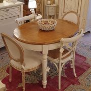 Tavolo ovale alllungabile in legno di ciliegio in finitura bicolore. Dall'alto. Arredamento classico contemporaneo Siena e Firenze